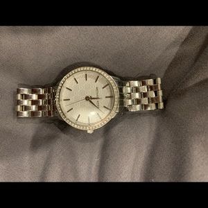 Women’s silver Micheal Kors watch